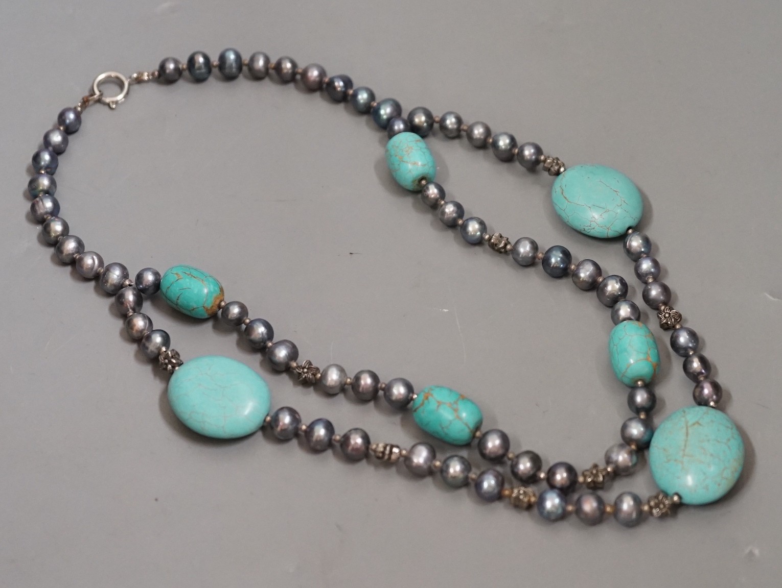 A single/double strand Tahitian? cultured pearl and turquoise necklace, 54cm.
